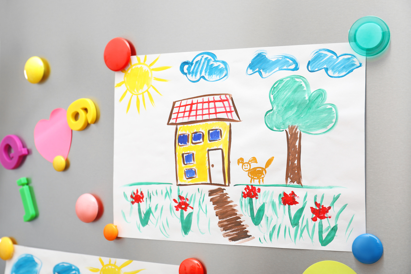 Child's Drawing and Magnets on Refrigerator Door as Background